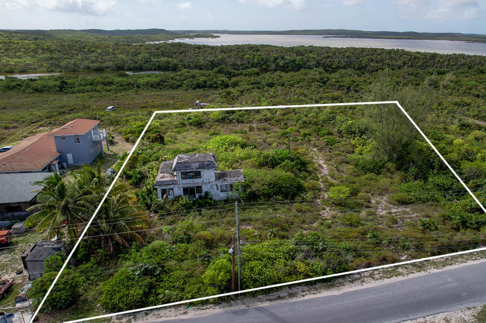 Large property one lot from a beautiful beach on the calm west side of San Salvador Island